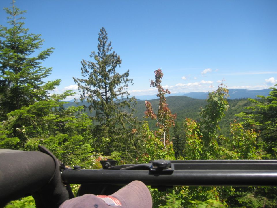 Interior view of a Jeep Wrangler looking out at a mountain vista