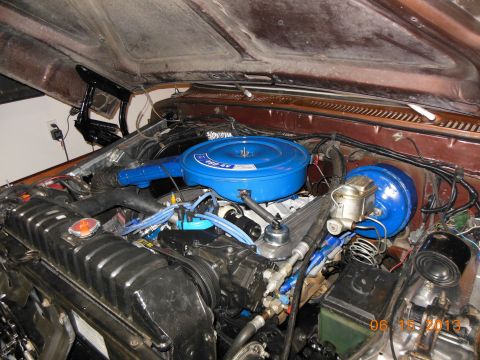 1979 Ford F-150 - View of the engine bay, a blue air cleaner assembly and brake booster.