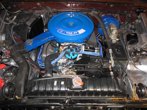 1979 Ford F-150 - Close-up view of a Ford 460-4V engine, showing the air intake, distributor, and radiator.