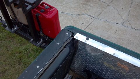 1986 Ford Bronco - Driver's side rear corner. Except for the spacing of the next to last screw (which varies from left to right), it's a mirror image of the p…