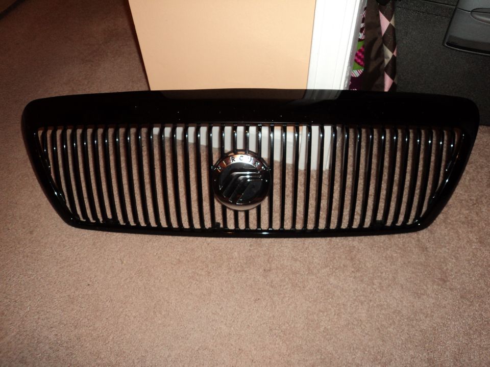 Black Mercury grille with chrome emblem