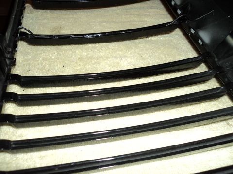 2004 Mercury Grand Marquis - Close-up view of a black horizontal grille, likely a replacement part.
