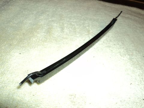 2004 Mercury Grand Marquis - A single black automotive trim piece is shown against a light-colored, textured background.