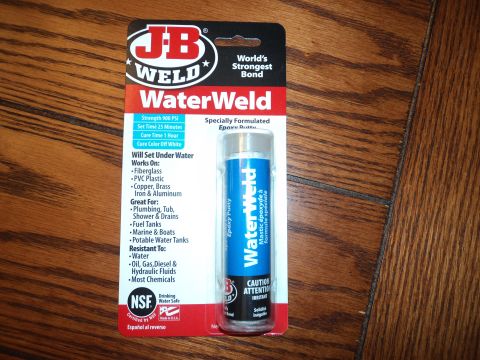2004 Mercury Grand Marquis - Package of JB Weld WaterWeld epoxy putty, designed for underwater repairs.