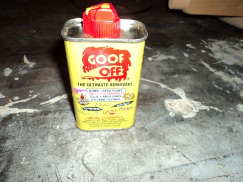 2004 Mercury Grand Marquis - A can of Goof Off cleaner sits on a workbench.
