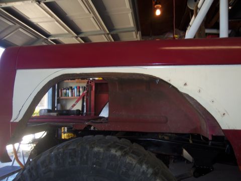1968 Ford Bronco - This 1968 Ford Bronco shows custom bodywork on the rear fender, with cut lines and exposed metal.
