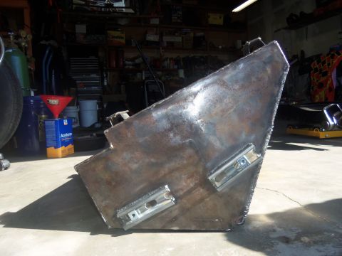 1968 Ford Bronco - Custom fabricated metal part with mounting brackets, likely for a vehicle modification.