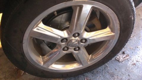 2003 Mercury Marauder - Close-up of a vehicle's wheel, showing the brake system components.