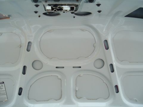 1991 Ford LTD Crown Victoria - Underside of car hood showing structural bracing and latch mechanism.