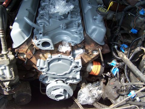 1991 Ford LTD Crown Victoria - Engine components, including intake manifold and valve covers, are shown disassembled.