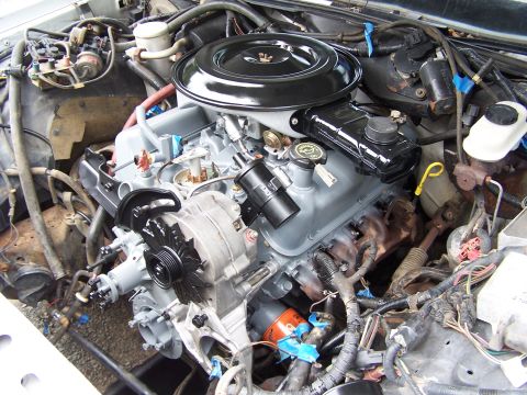 1991 Ford LTD Crown Victoria - Close-up view of a vehicle's engine bay, showing various components and wiring.