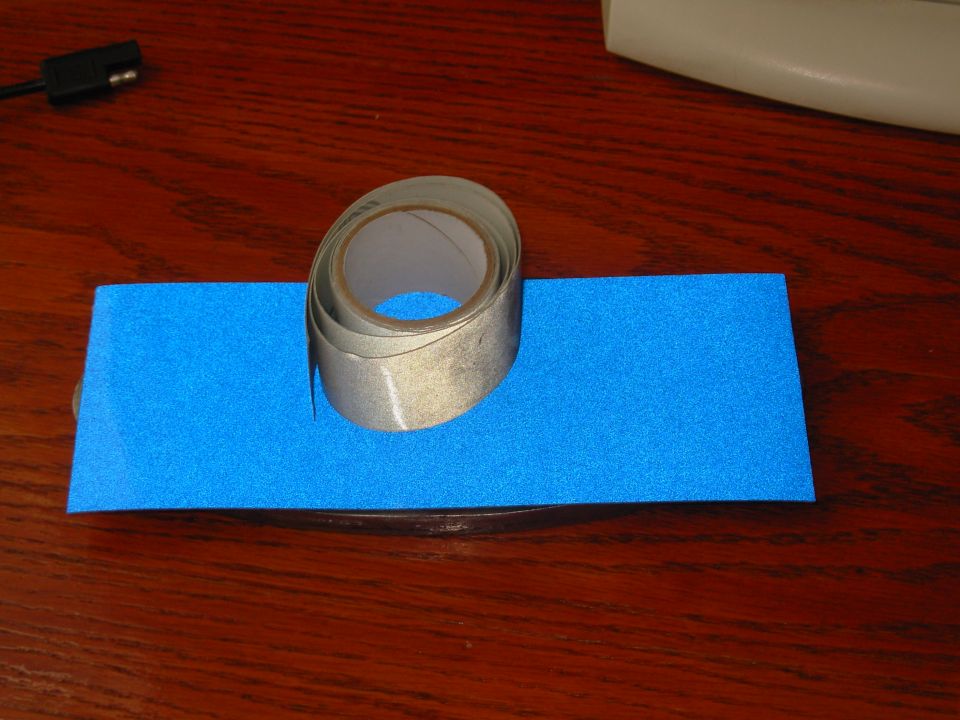 This 3M reflective blue tape is just big enough to fill my grille guard emblem, and I'll use the white on the letters & edge.