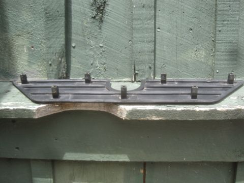 1993 Ford Bronco - This black plastic trim piece features multiple clips for attachment.