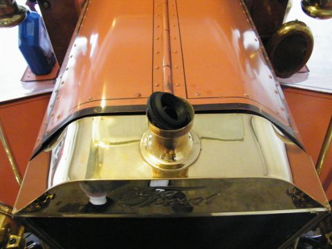 1912 Ford Model T - The brass radiator grille of a 1912 Ford Model T displays the iconic Ford script.
