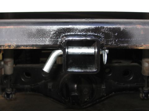 1993 Toyota 4Runner - Close-up view of a trailer hitch receiver, showing the pin and clip mechanism.