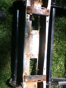 1996 Ford Bronco - Front bumper assembly for a 1996 Ford Bronco, showing rust and mounting points.