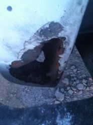 1996 Ford Bronco - This vehicle part shows extensive rust and damage, indicating a need for repair or replacement.
