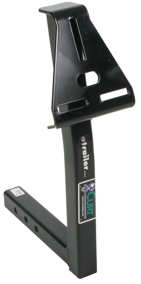 1976 Ford Bronco - A black trailer hitch part is shown, "etrailer.com" and "CURT" branding on its side.