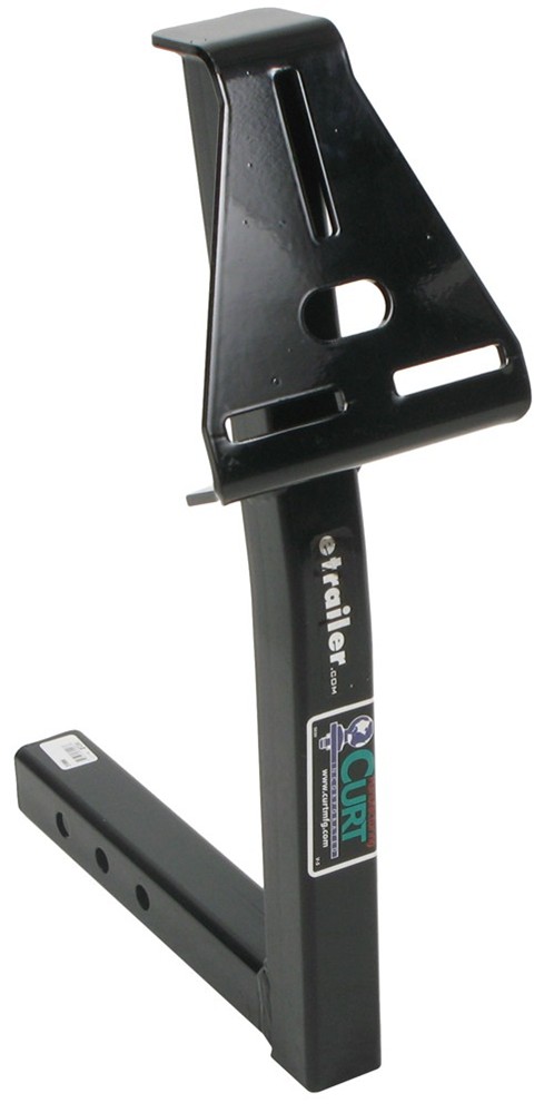 Black trailer hitch part with "etrailer.com" and "CURT" logos visible