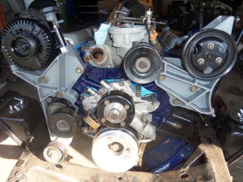 1968 Ford Bronco - This image displays a Ford V8 engine, likely a 351 Windsor, with various components attached.