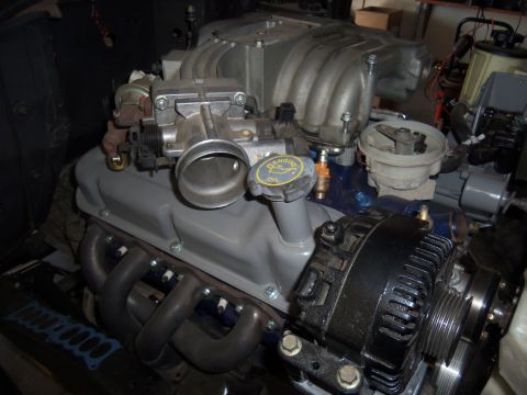 1968 Ford Bronco - Close-up view of an engine assembly, showing various components and wiring.