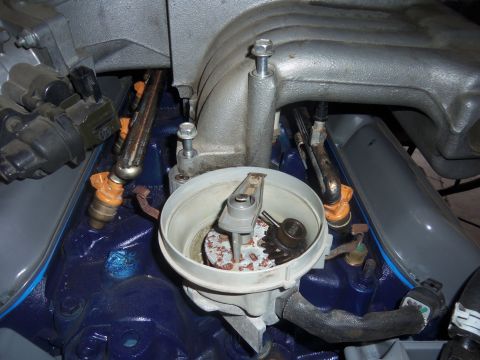 1968 Ford Bronco - Ford 351W engine distributor and fuel injectors shown in detail.