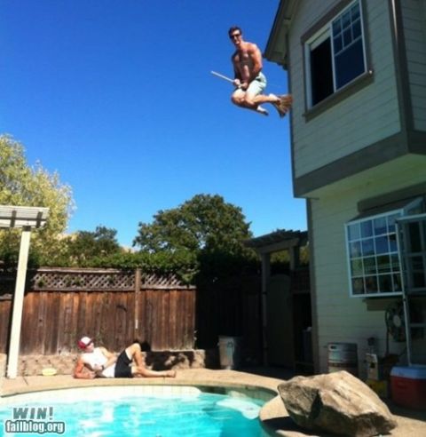 1996 Ford F-150 - A man appears to be flying off a house on a broomstick while another person relaxes by the pool.
