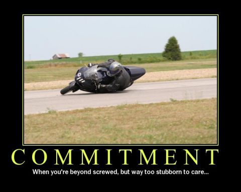 1996 Ford F-150 - A motorcycle is shown on its side on a road, with a rider still on it, in a rural setting.