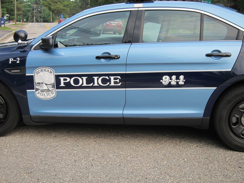 Close-up of Durham Police door decal with shield, POLICE and 911 lettering