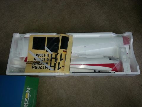 2003 Ford Crown Victoria - Model airplane in its original packaging, showing decals with registration N1208H and a German flag.