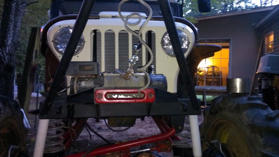Off-road vehicle front with winch and large tires