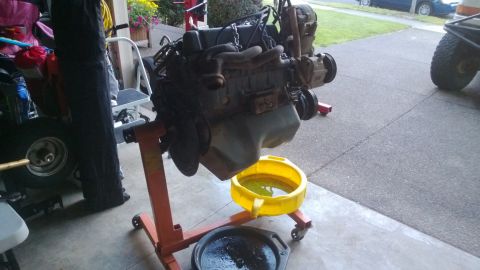1994 Ford Bronco - Engine removed from vehicle and mounted on an engine stand for service.