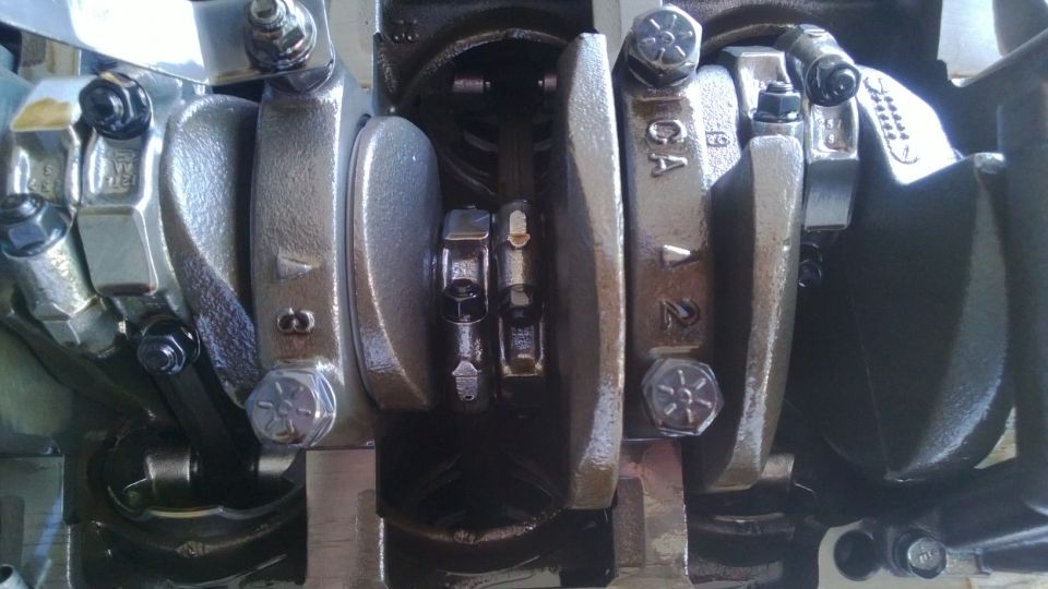 Engine crankshaft and connecting rods with visible numbers