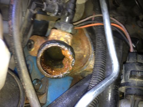 1978 Ford Bronco - This engine part shows significant rust and corrosion, indicating potential wear and tear.