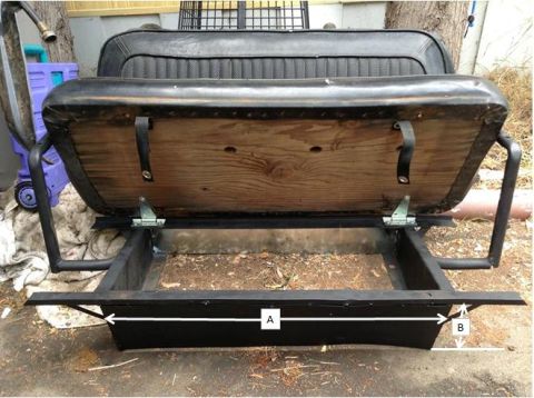1973 Ford Bronco - This image shows a vehicle seat frame with an open storage area beneath it, dimensions labeled A and B.