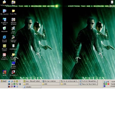 2000 Ford Taurus - Desktop wallpaper displays characters from The Matrix movie, with various application icons visible.