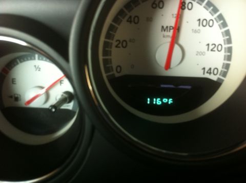 2010 Dodge Challenger - The dashboard displays the fuel gauge and the outside temperature reading.