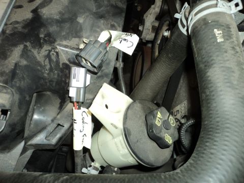 2004 Mercury Grand Marquis - Close-up of engine bay wiring, likely for a cooling fan, with labels attached.