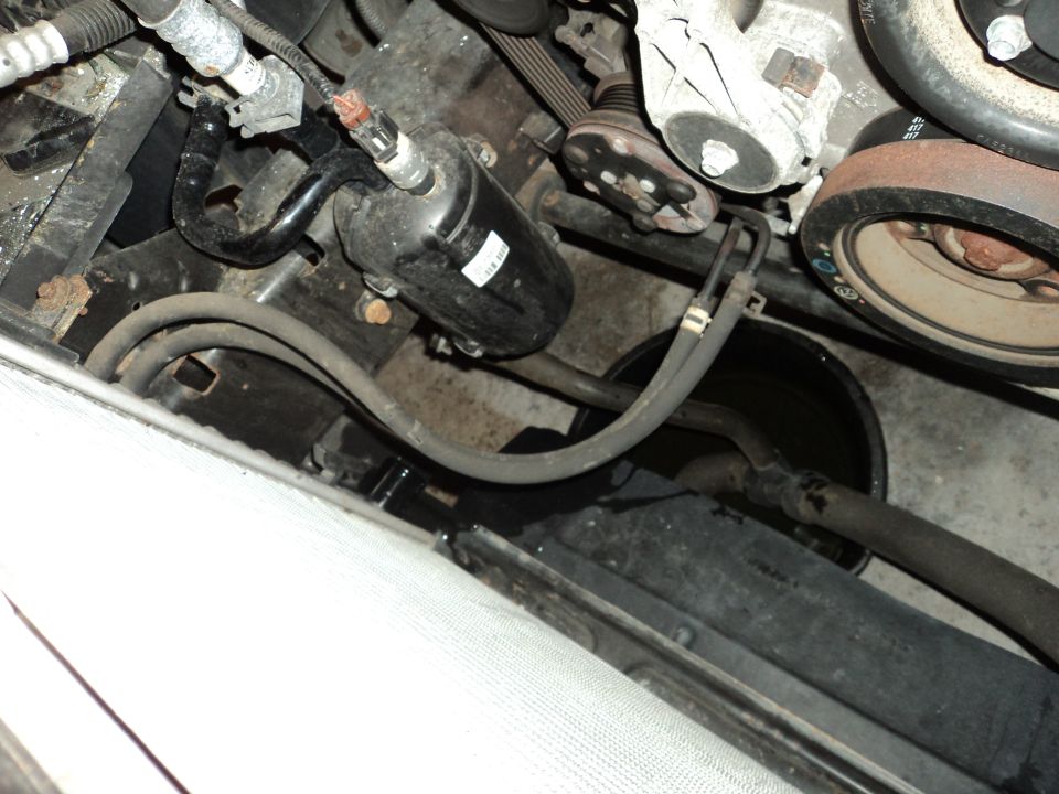 Engine bay hoses and pulleys, black canister