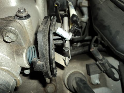 2004 Mercury Grand Marquis - Throttle body linkage detail, showing cable attachment and return spring mechanism.