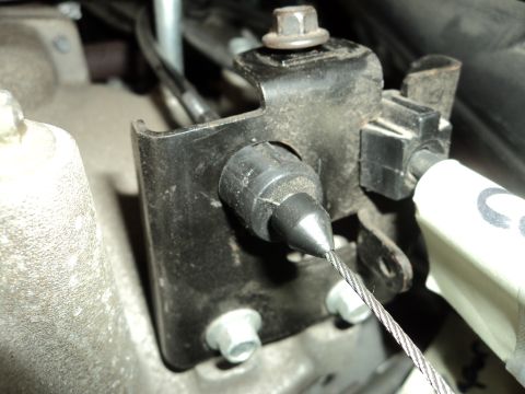 2004 Mercury Grand Marquis - This image shows a close-up view of a throttle cable mechanism, not a specific vehicle model.
