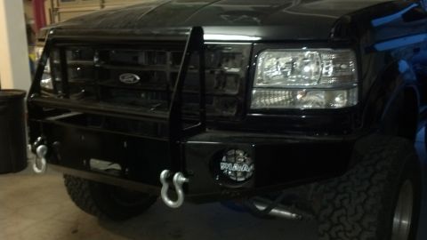 1995 Ford Bronco - This truck features a heavy-duty bull bar and auxiliary lighting on the front bumper.