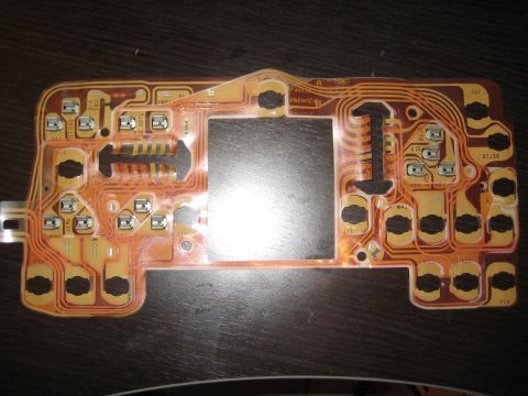 1996 Ford Bronco - A close-up view of a vehicle's circuit board, showing its intricate design and electronic components.