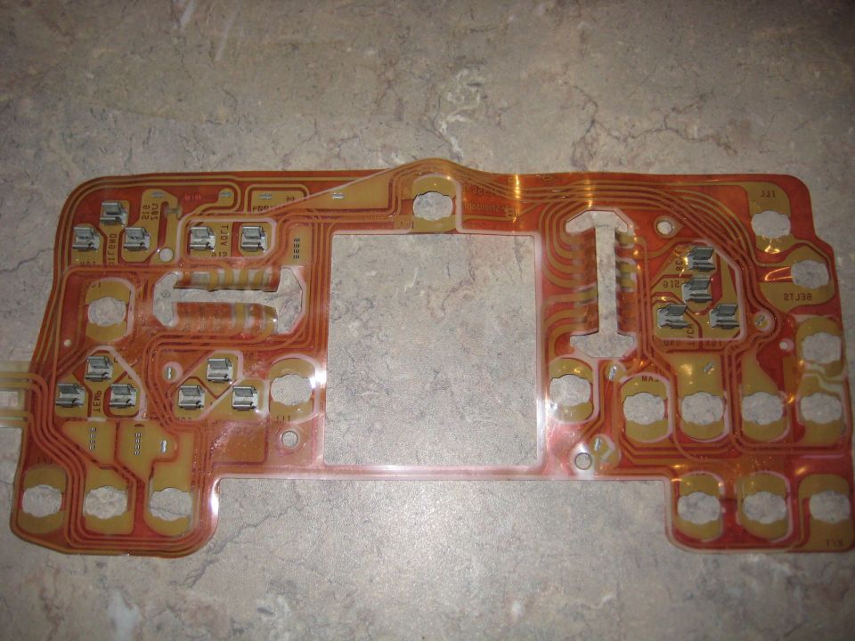 Circuit board with electronic components and traces