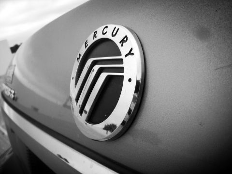 2003 Mercury Grand Marquis - The Mercury emblem is clearly visible on the car's exterior.