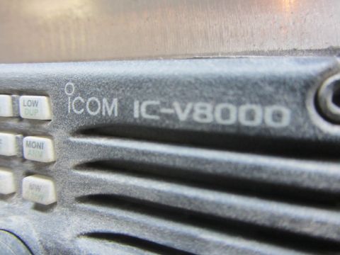 1990 Ford Bronco - Close-up of the Icom IC-V8000 mobile radio faceplate showing the brand, model name and side buttons.