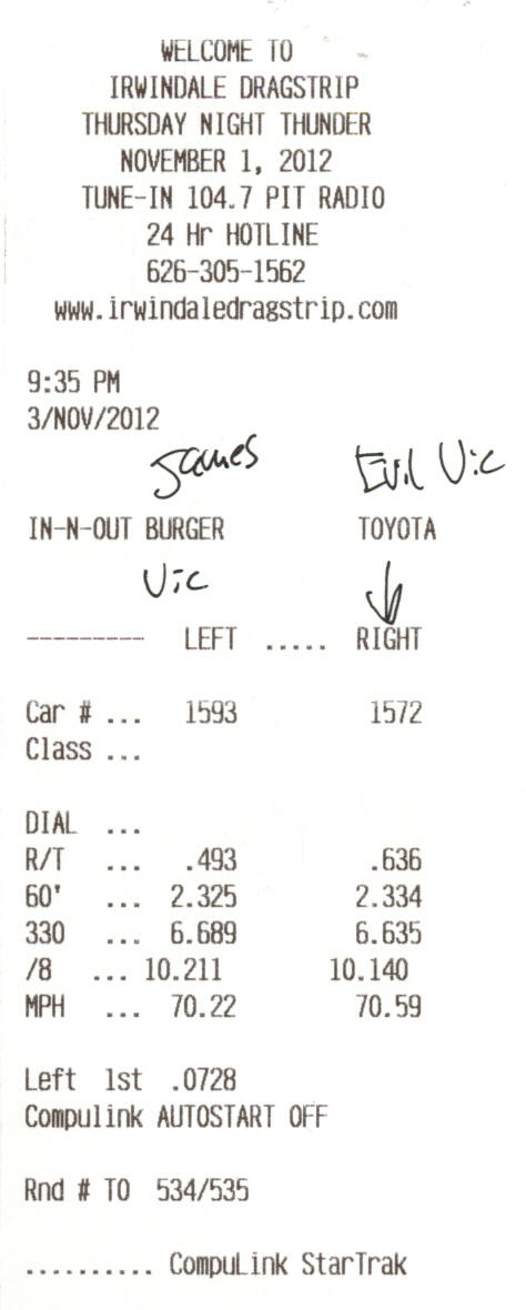2003 Ford Crown Victoria - Photo of an Irwindale Dragstrip time slip with handwritten notes and run data, not a technical document.