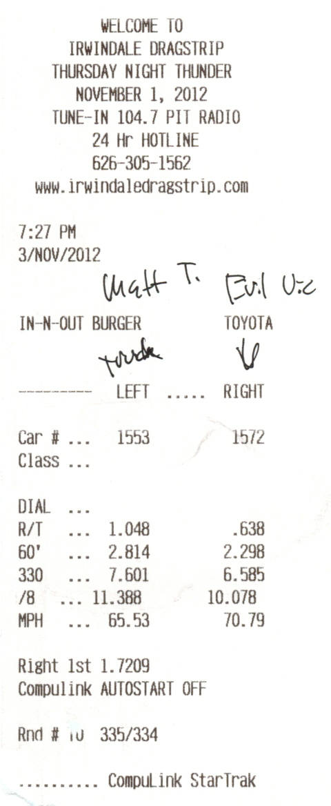 2003 Ford Crown Victoria - Photo of an Irwindale Dragstrip time slip showing reaction time and elapsed-time data, not a technical document.
