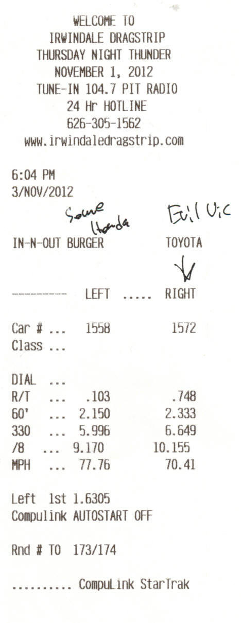 2003 Ford Crown Victoria - Photo of an Irwindale Dragstrip time slip listing reaction time and ET figures, not a technical document.