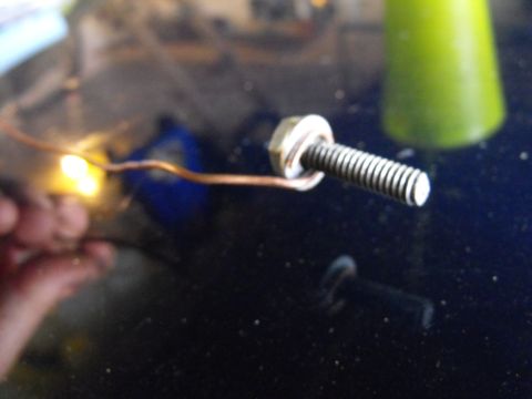 1986 Chrysler Fifth Avenue - After you've drilled a hole, slightly larger than 1/4", through the center of the "crater" left by the offending stud, you can feed the bol…